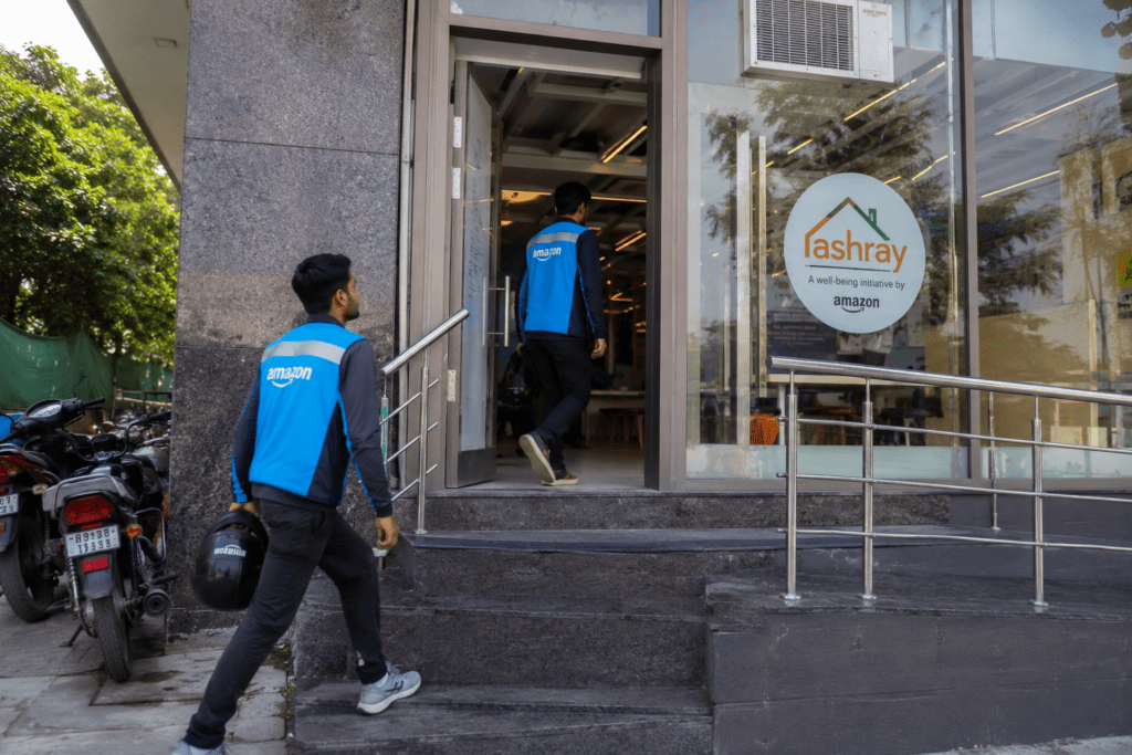 Amazon entrance with delivery staff and bikes